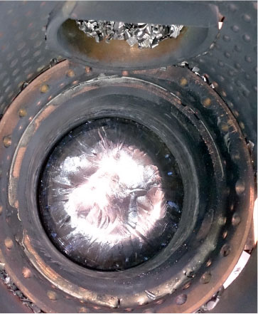 Bar-casting furnace seen from the top with top-feed